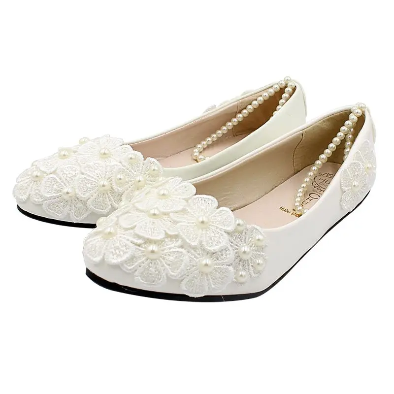 ivory flats with ankle strap