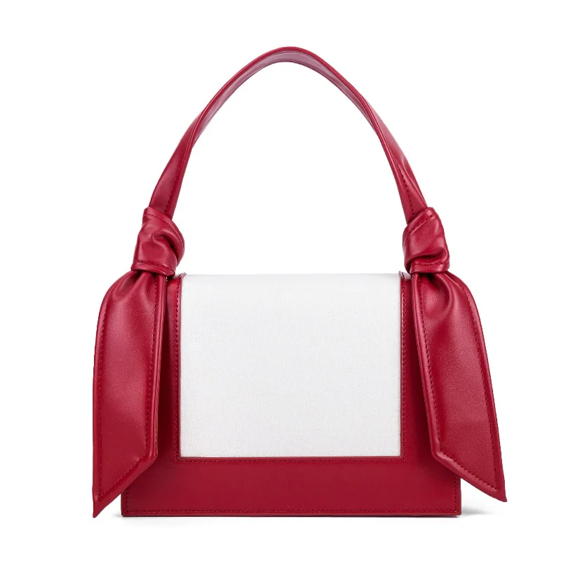 

2018 The New Korean Version of The Fad Fashion Color Collision Oblique Small Square BAG Canvas Splicing Knots Hand Bag Tide.