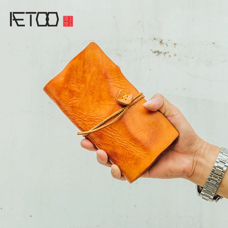 

AETOO Handmade cowhide multi-function wallet mobile phone bag document bag Hand grab bag notebook bag men's handbag