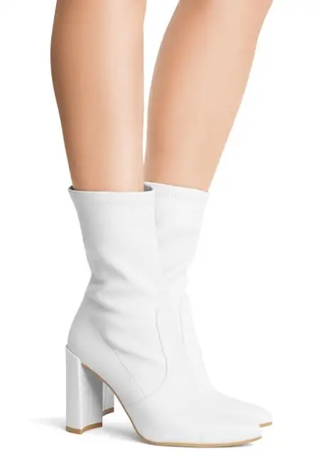 white and black high heel boots