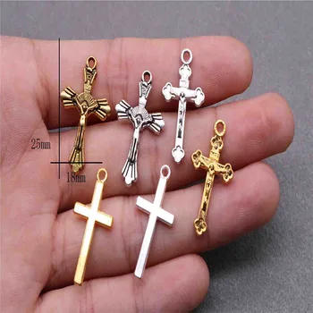 

100 pieces of the Catholic Universal Mini Cross Medal. Alloy Jesus Cross Necklace Bracelet Medal