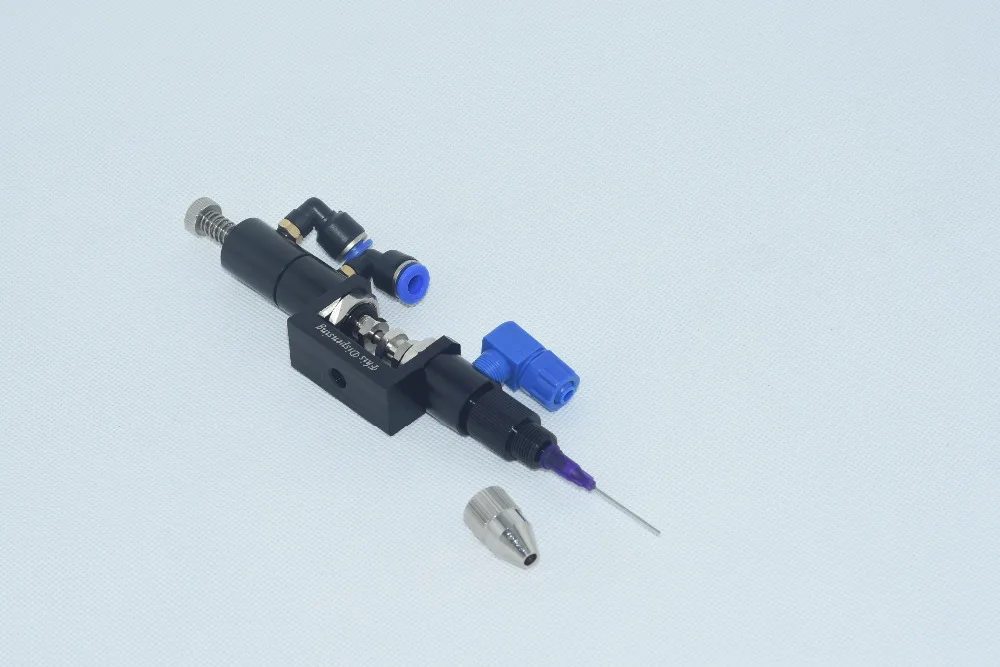 

Double action top pin single liquid dispensing valve