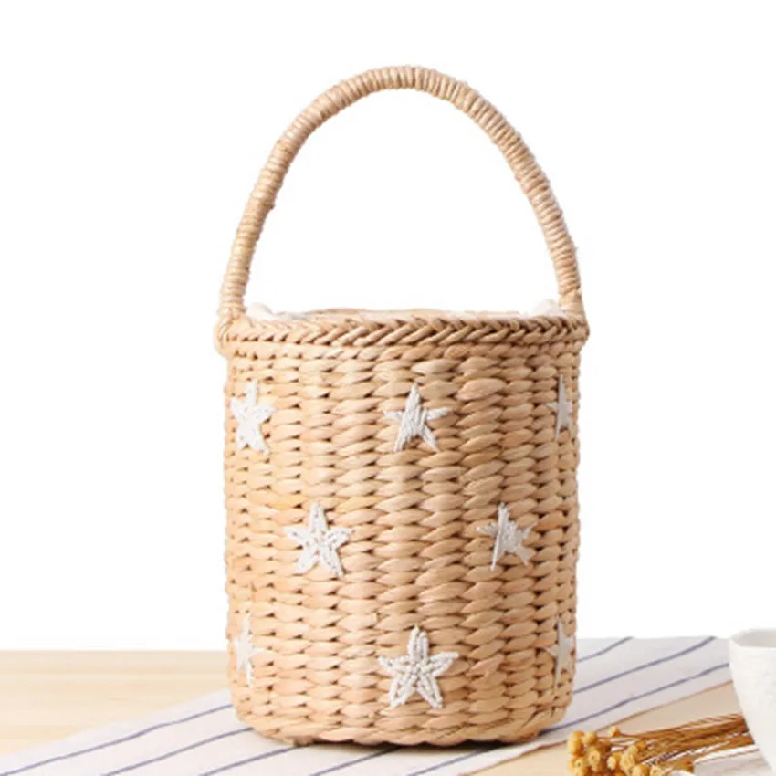 

Portable buckets woven bag China wind hand carry hand embroidered stars smile face straw bag summer vacation beach bag