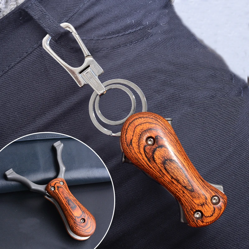

Easy to Carry! Black Folding ABS Slingshot Key Ring Professional Catapult Steel Powerful Accurate Shooting Hunting Archery