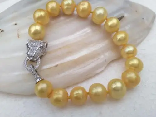 

Shipping >>>> 18" AAA 11-12MM NATURAL SOUTH SEA GENUINE GOLD PEARL BRACELET LEOPARD BUTTON