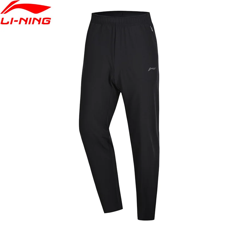 

Li-Ning Men Running Sweat Pants Regular Fit Comfort FC-FREE PROOF 92% Polyester 8% Spandex LiNing Sports Trousers AYKP021 MKY472