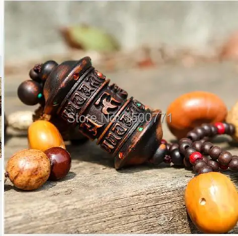 

Tibetan prayer wheel Nepal woodcarving Pu Tizi car hanging pendant car ornaments car