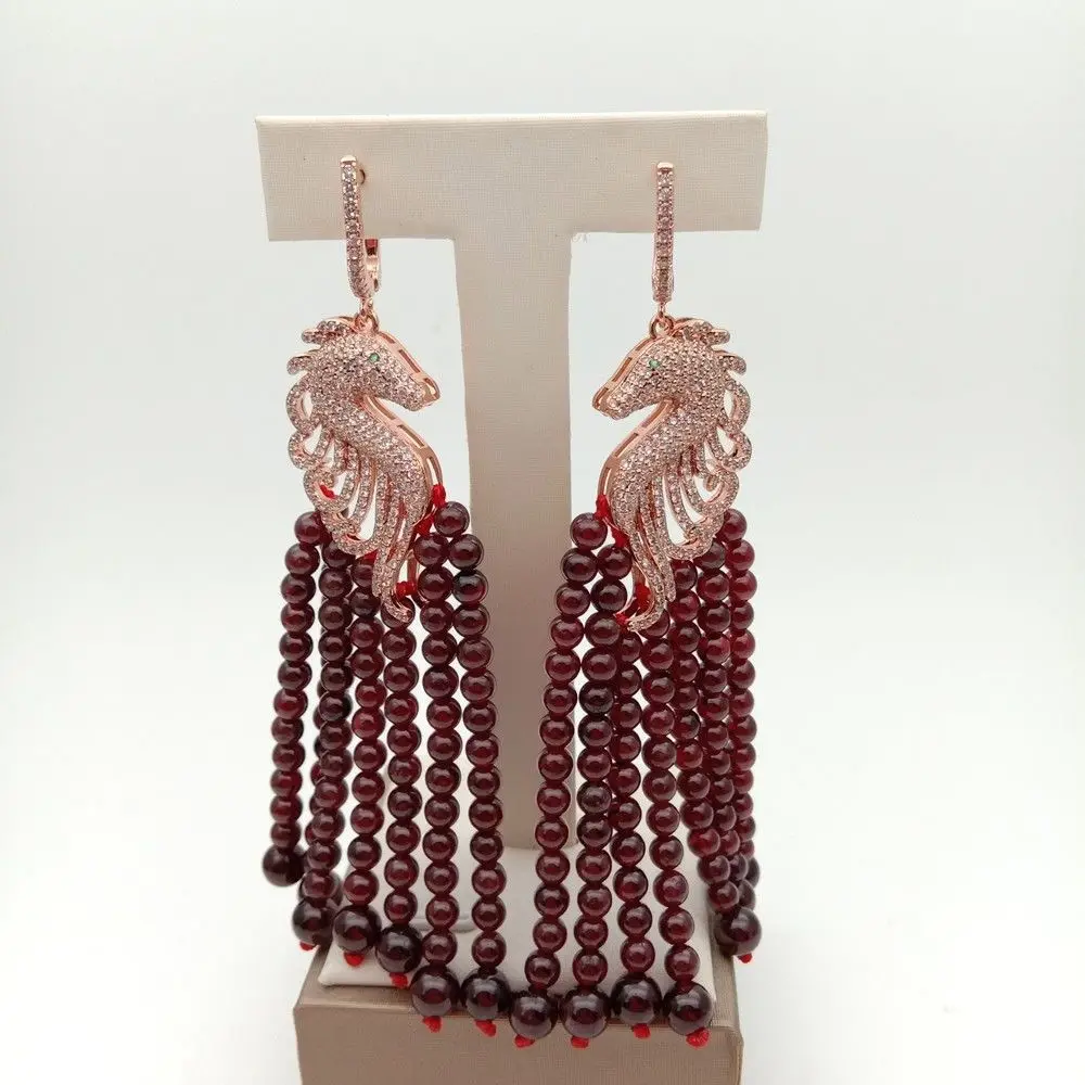 

Red Garnet Rose Golden Plated Cz Pave Sea Horse Earrings