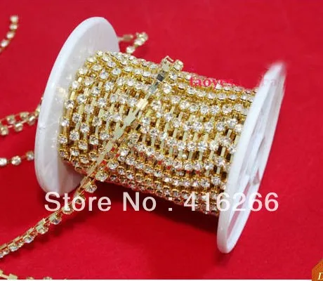 

Free shipping!Gold chain Rhinestone cup chain ,ss12 Crystal stone,10yards/roll, garment accessories,Tube packaging
