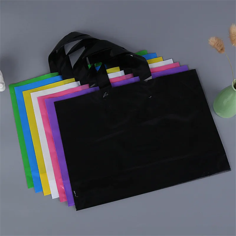 

500pcs/lot custom logo printed plastic packing shopping bags with handle,customized garment/clothing/gift packaging bag