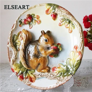 

Ceramic squirrels eat pineapple pottery plates animal dish wall hanging porcelain for home decoration gift