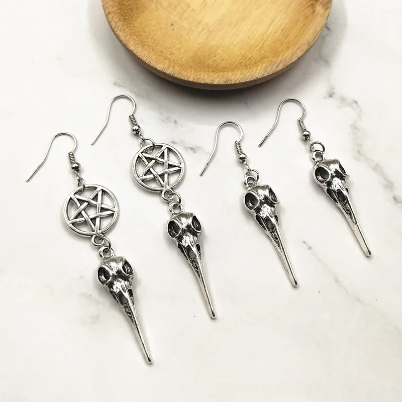 

Vintage personalise antique Silver Inverted pentacle, raven skull earrings.