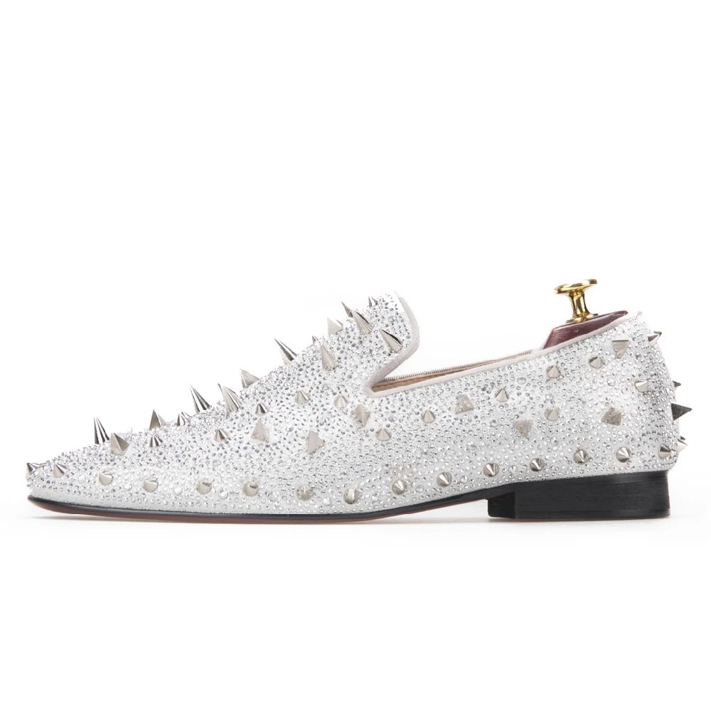 white and gold loafers with spikes