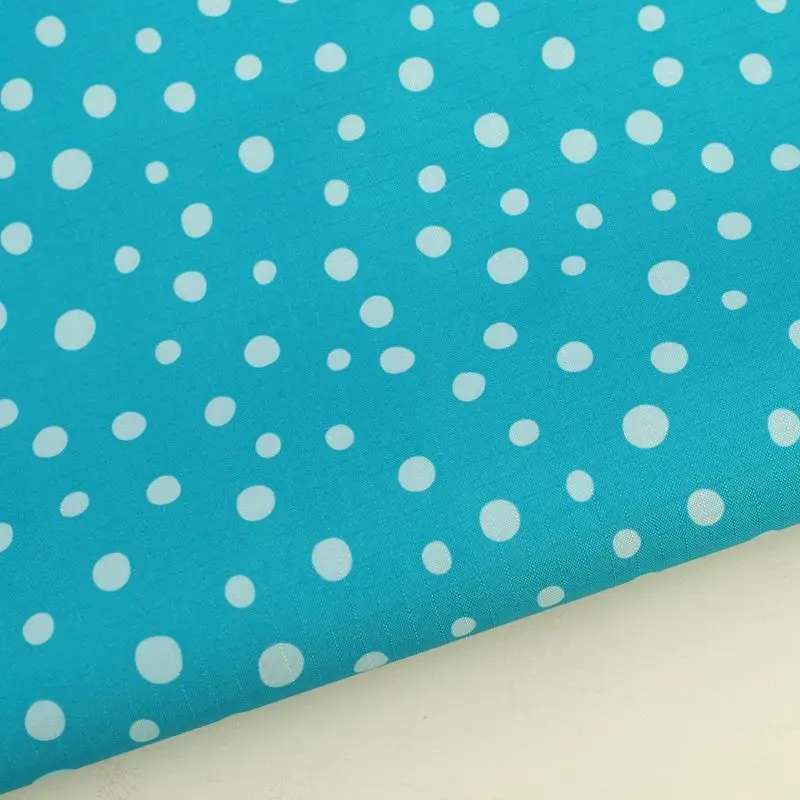 

PVC coated waterproof fabric - Dot on blue background (WF106)