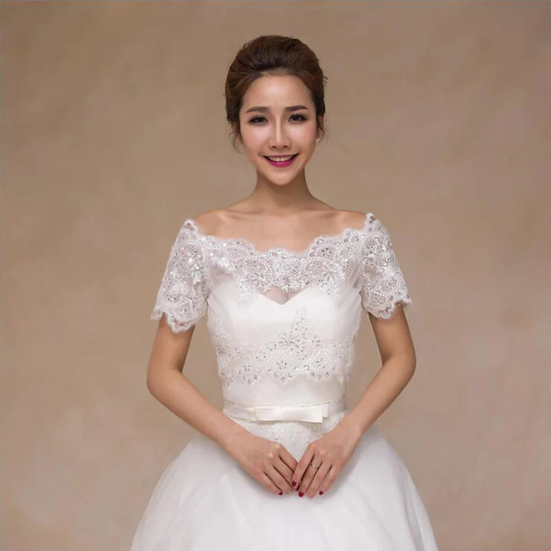 

Elegant Ivory Sequins Lace Bridal Boleros 2018 with short Sleeve Boat Neck Wedding Jacket Capes Wedding Accessories