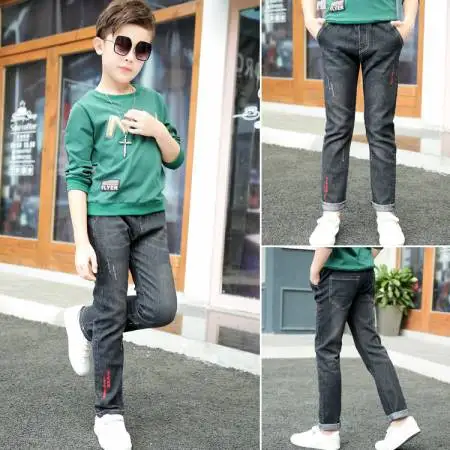 

2019 new Korean version of jeans and trousers with holes in elastic cotton for boys and children