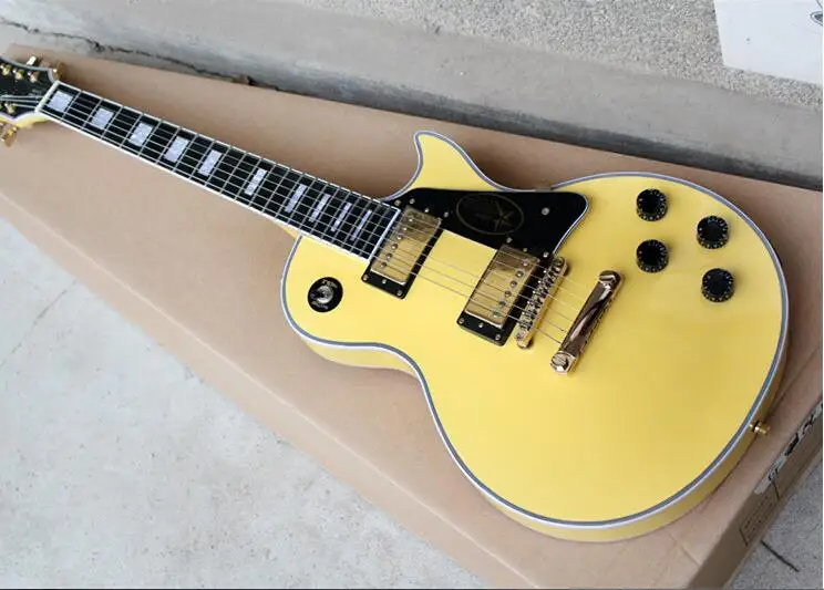 

Hot sale! Yellow Electric Guitar with Black Pickguard,Rosewood Fretboard,Golden Hardwares,can be customized free shipping