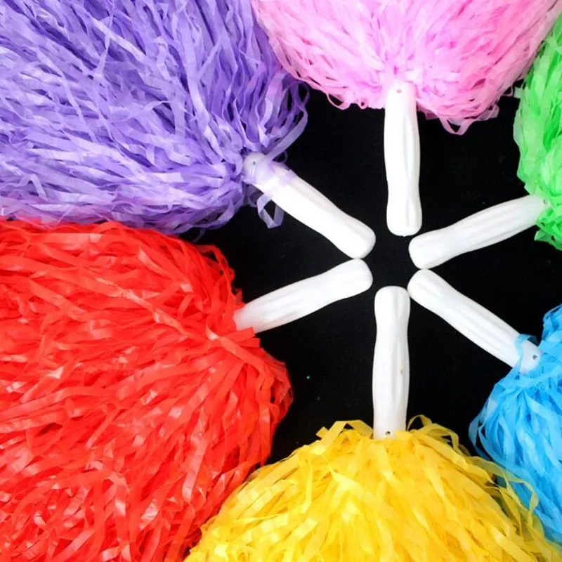 пом пом черлидерш. помпоны болельщика. розовые помпоны для черлидинга. помпоны для танцев. помпоны для черлидинга.