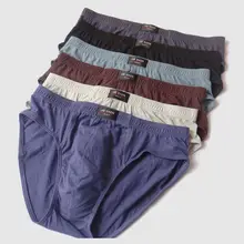 2015 New arrival Solid Briefs Factory Direct Sale 4pcs / Lot Mens Brief Cotton Mens Bikini Underwear Pant For Men Sexy Underwear
