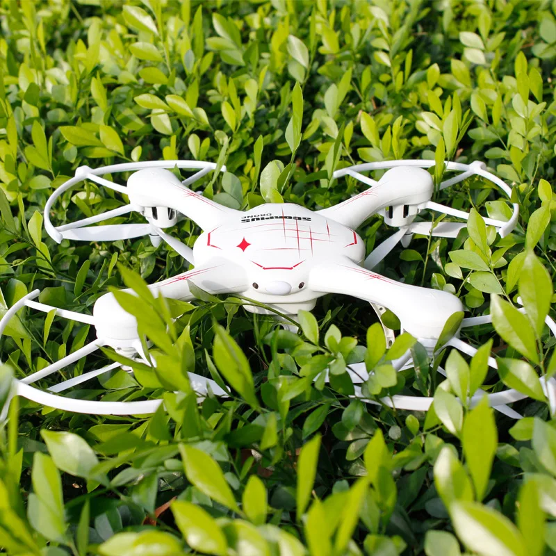 

2017 hot enter-level RC quadcopter kids toy 777-955C 2.4G 4CH headless one key return rc helicopter Drone with 2.0MP hd camera