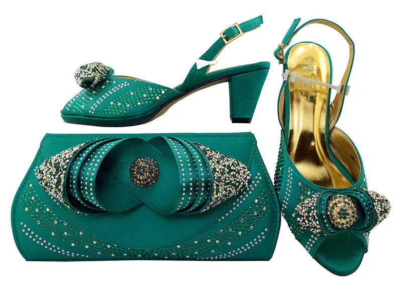 Wonderful teal green pump shoes perfect match with handbag