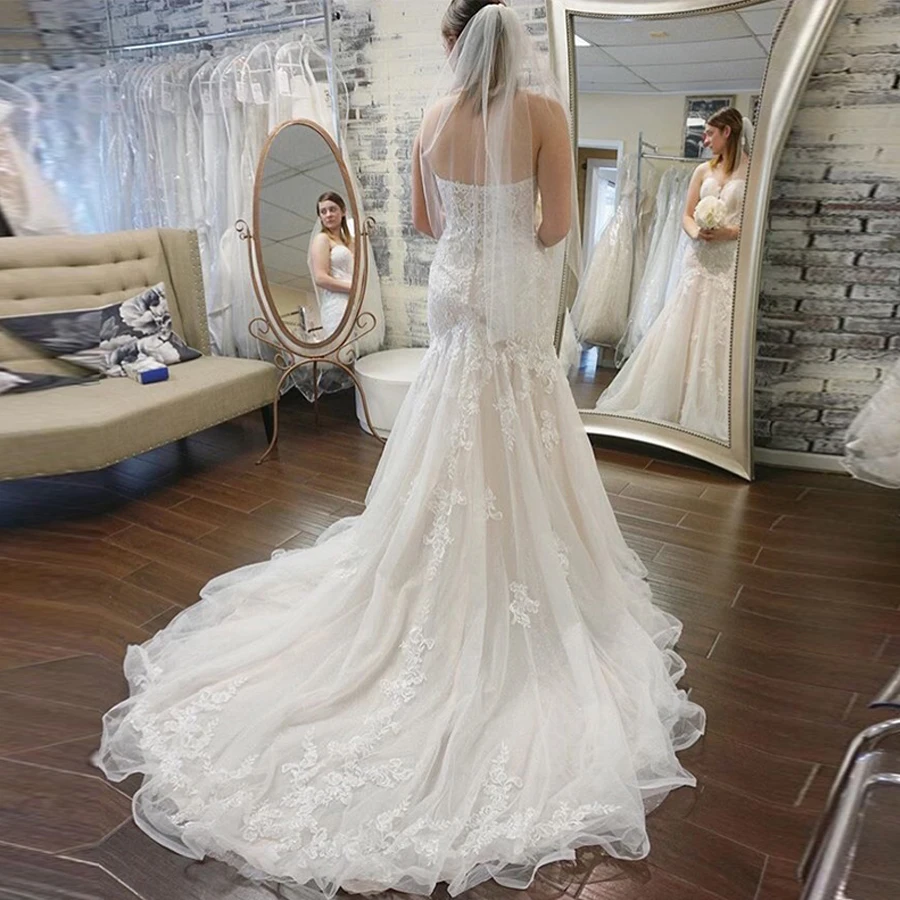 

Charming Sweetheart Mermaid Bridal Dress with Lace Applique Backless Button Sweep Train Elegant Wedding Dress vestido de novia