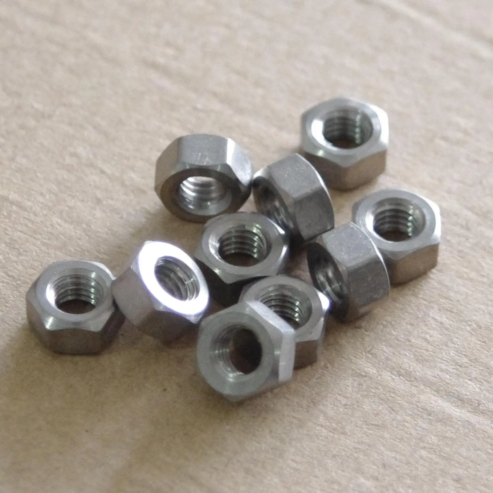 

10pcs GR5/TA2 M3/M4/M5/M6/M8 Titanium Ti Hex Nut For CYCING
