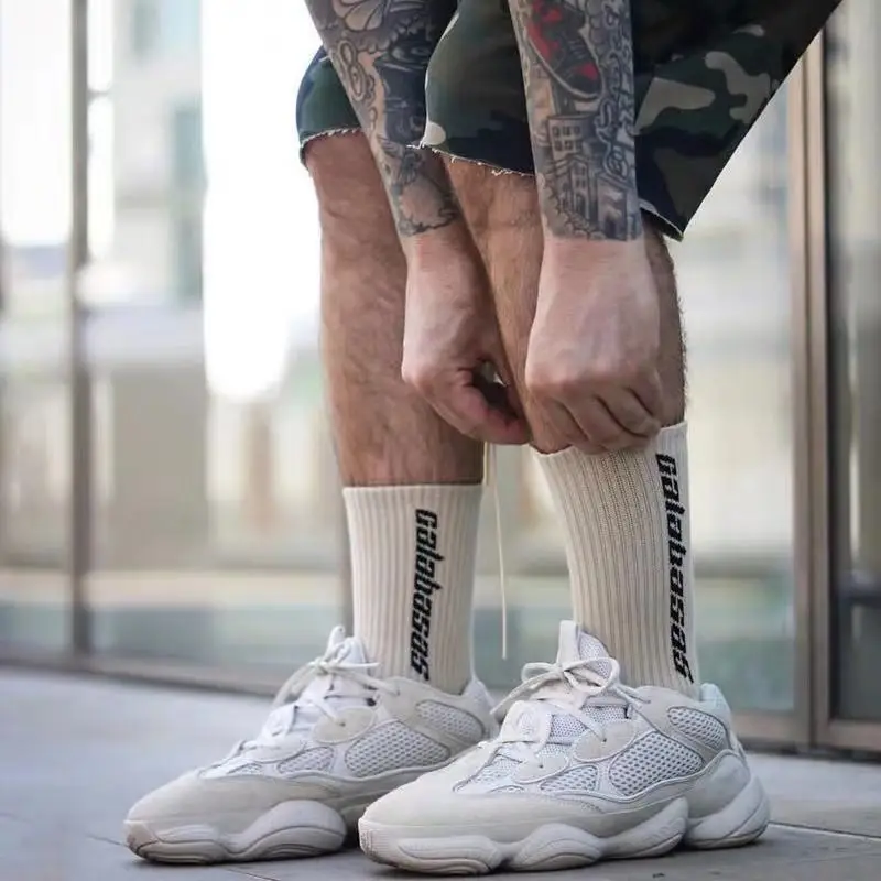 

Tide brand ins high to help the middle of the tube cotton grandfather with the letter socks skateboard hip hop sports tide socks