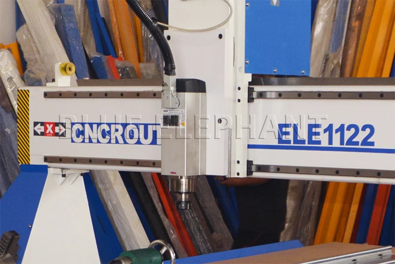 3.5kw hqd air cooling spindle of 1122 4 axis cnc router with rotary device on table surface