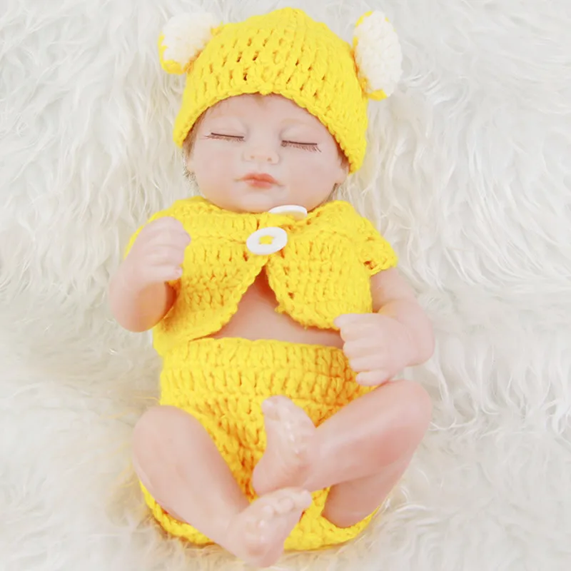 

Dressed Yellow Cloth Full Silicone Reborn Baby Doll Girl and Boy 11'' 27cm Realistic Newborn Baby Doll with Close eyes Hot Sale