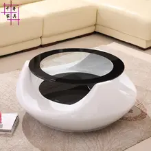 Hollow out of tea table. Creative living room toughened glass tea table. Round tea table