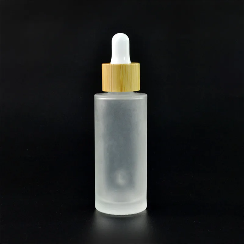 Download 50pcs*30ml frosted clear glass dropper bottle with bamboo lid bamboo cosmetic packaging ...