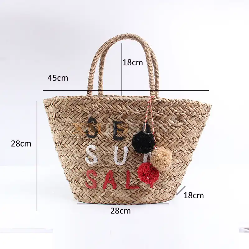 woven pom pom bag