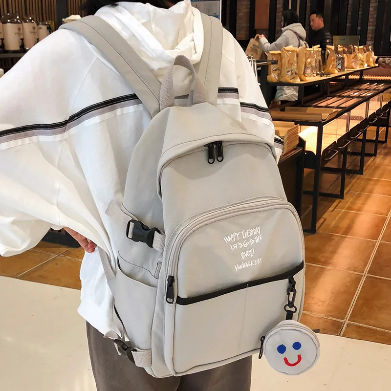 

Letter embroidery Nylon women backpack teenage girl cute waterproof Student backpacks small smile bag Pendant school female book