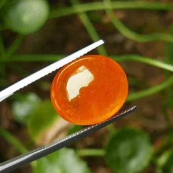 

22.29 Carat Vivid Fendase Spessartite Cabochon Certificate