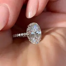 Huitan oval anel de dedo banda deslumbrante brilhante cz pedra quatro pinos configuração clássico presente aniversário de casamento para esposa & namorada
