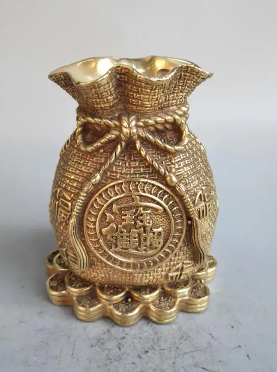 

Chinese Seiko carving brass money sack crafts statue