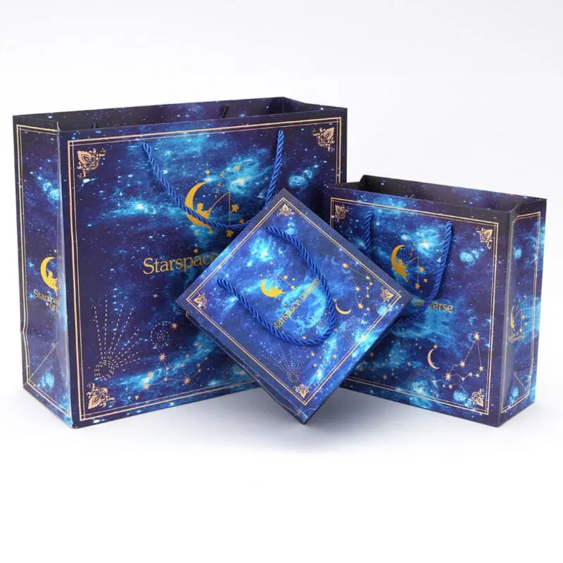 

20 Pcs/lot Cosmic Starry Sky Print Paper Bag with Handles Birthday Christmas Event Gift Bag Business Holiday Gift Bag