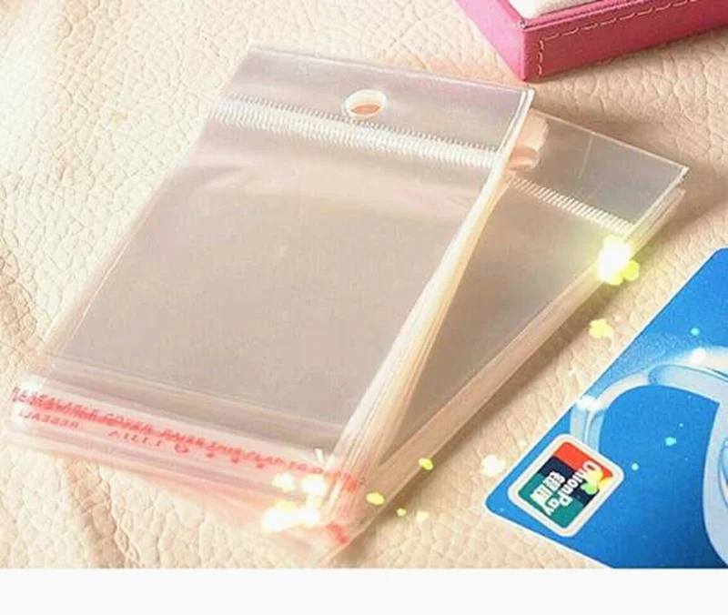 100pcs 7x14cm Clear Self Adhesive Seal Plastic Bags Transparent Resealable OPP Packing Poly Bags Pick Beads Hanging Holes