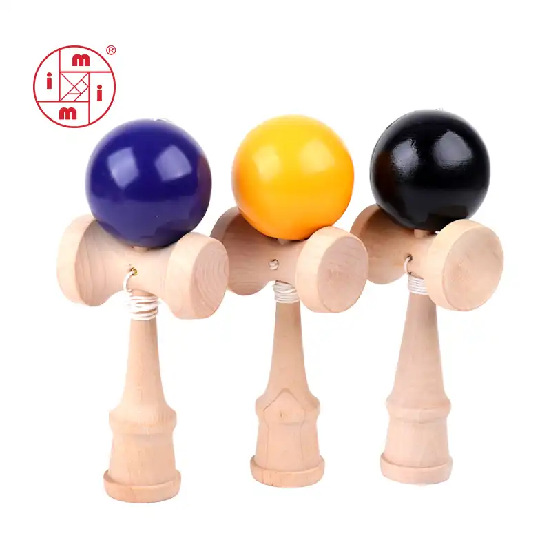 wooden toy with ball and string