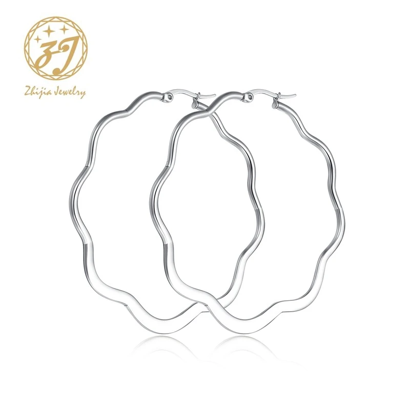 

Zhijia European Punk Fashion Sliver color Twist Circle Donut Ear Loops Stainless Steel Jewelry Hoop Earring for woman