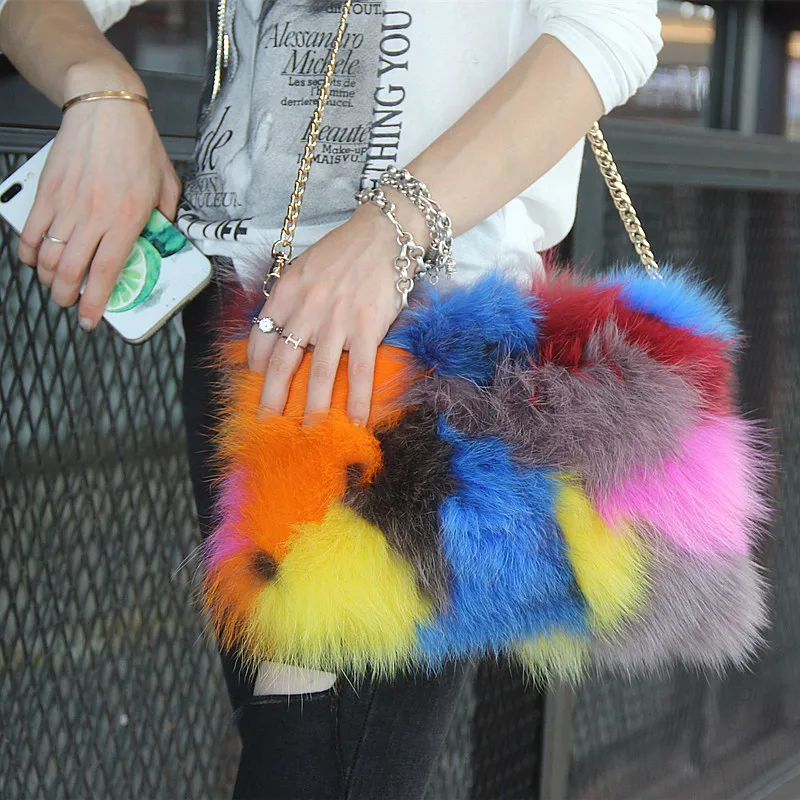 

Autumn and winter street shooting Personality panelled color stitching one shoulder slung hairy bag Fox fur leather clutch bag