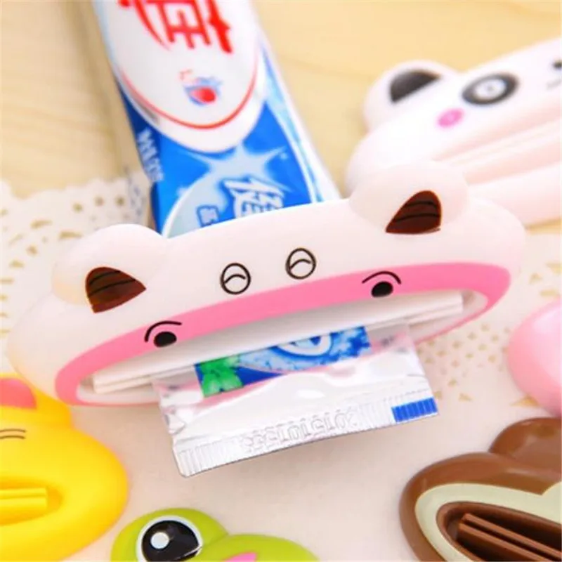 FEIGO 1Pc Cute Animal Multifunction SqueezerToothpaste Squeezer Home Tube Rolling Holder Squeezer Easy Toothpaste Dispenser F102