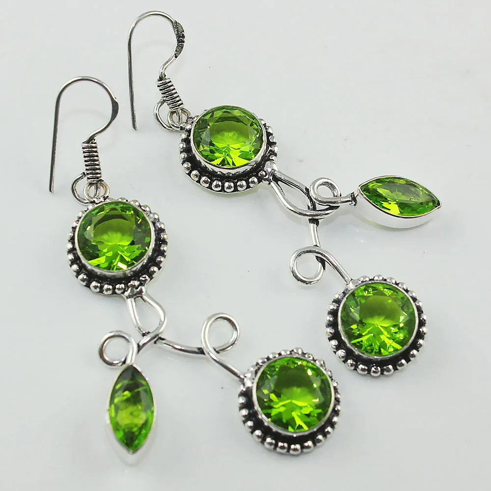 

Peridot Earrings Silver Overlay over Copper , 64 mm, E1081