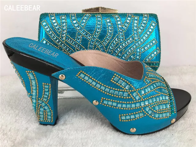 teal colour shoes and bag