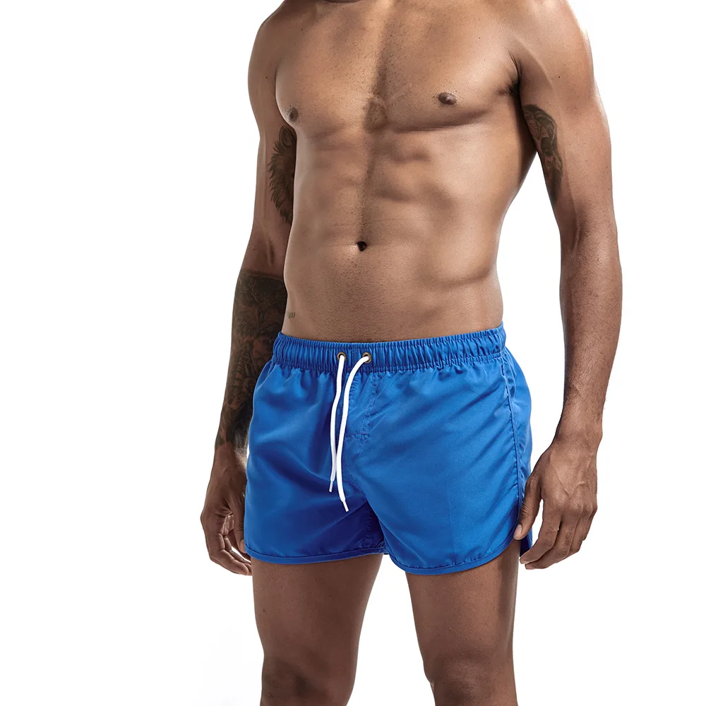 Men's sport running beach Short board pants Hot sell swim trunk pants Quick-drying movement surfing shorts GYM Swimwear for Male Men's sport running beach Short board pants Hot sell swim trunk pants Quick-drying movement surfing shorts GYM Swimwear for Male