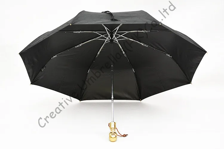 

Skull handle,creative umbrella,2 times black coating,100%sunscreen,UPF>50+,parasol,three fold auto open&auto close ,windproof,