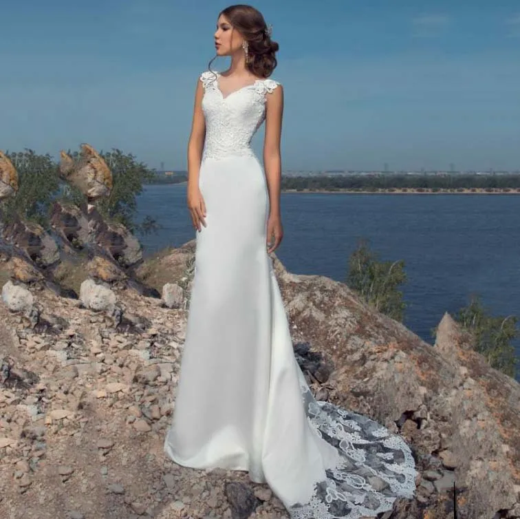 

Sexy Mermaid Fit And Flare Crepe Wedding Dress With Shaped Train Sheer O neck Sleeveless Bridal Gown
