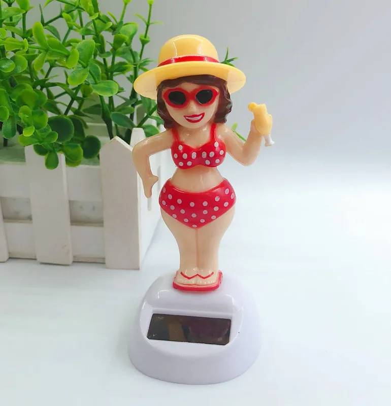 

Solar Powered Dancing Hula Girl Swinging Bobble Toy Shaking Head Cartoon Unicorn Doll Automobile Solar Girls Toys For Children