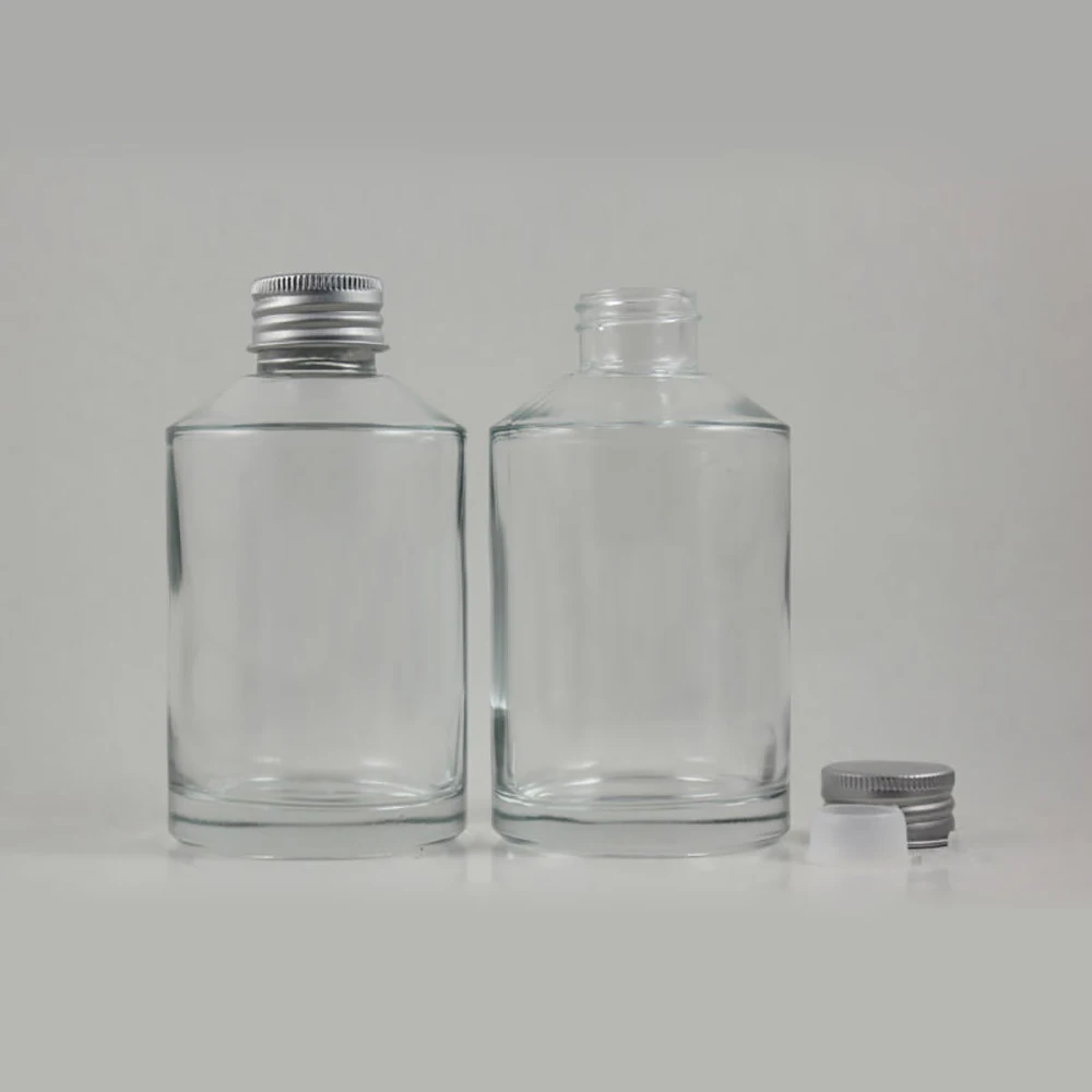 

200ml clear Glass bottle with matte silver aluminum screw cap and reducer,cosmetic packing,200ml glass cosmetic bottle or oil